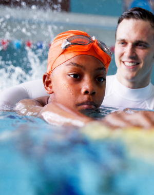 Child learning to swim at The Hayes Primary School