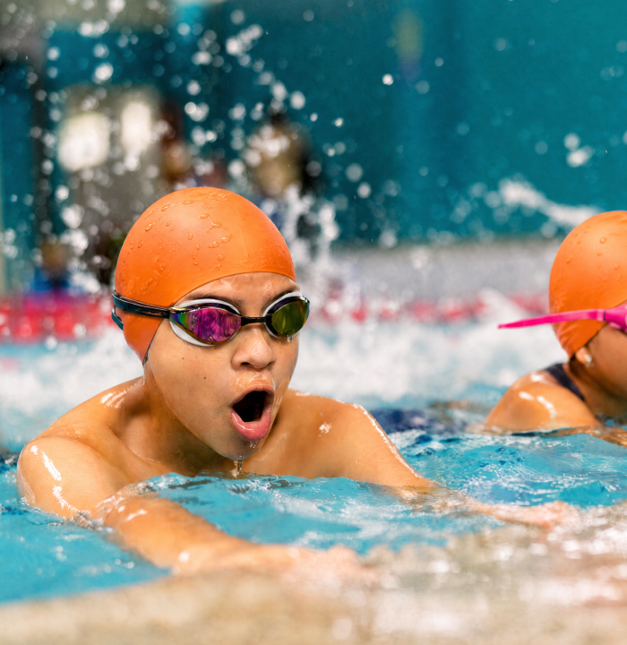 Children enjoying a swimming lesson